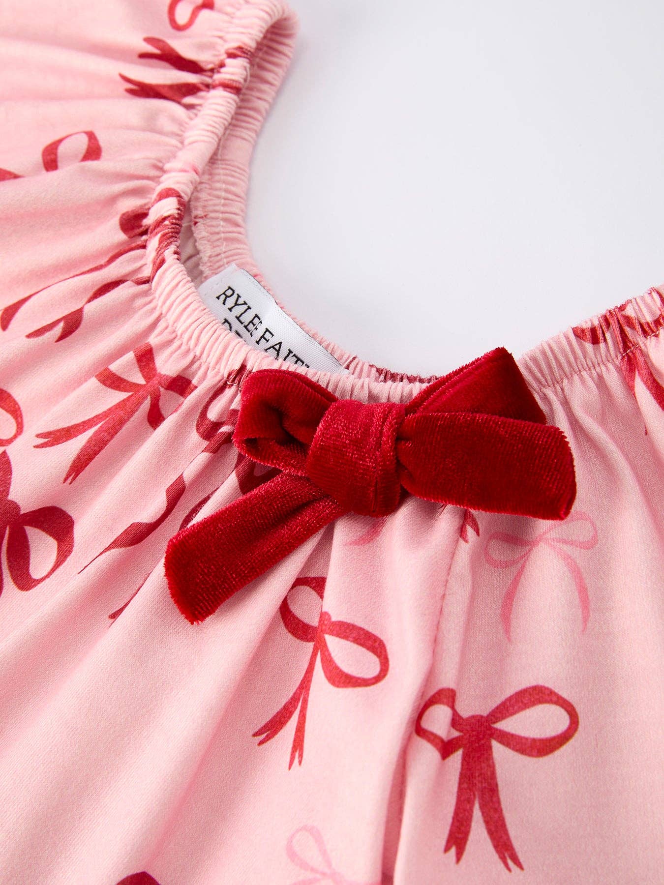 Christmas Bow Print Babygrow